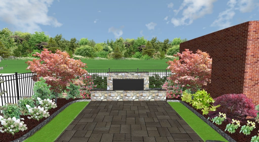 A landscaped patio with a stone outdoor fireplace, brick wall to the right, iron fence at the back, and various shrubs and trees surrounding the paved area&mdash;perfect for relaxing or featuring a dynamic content widget for added functionality.